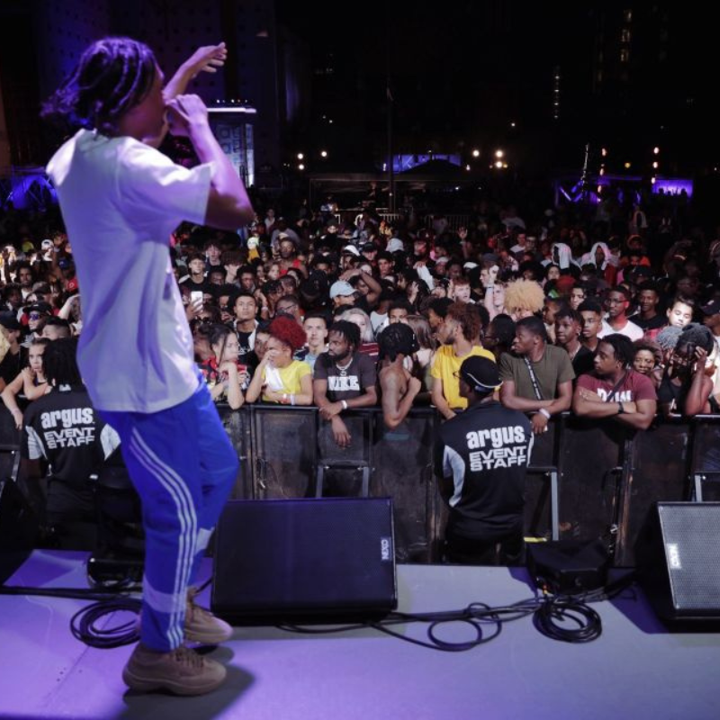 Mike Floss on stage at Destination Atlanta at the Georgia Freight Depot