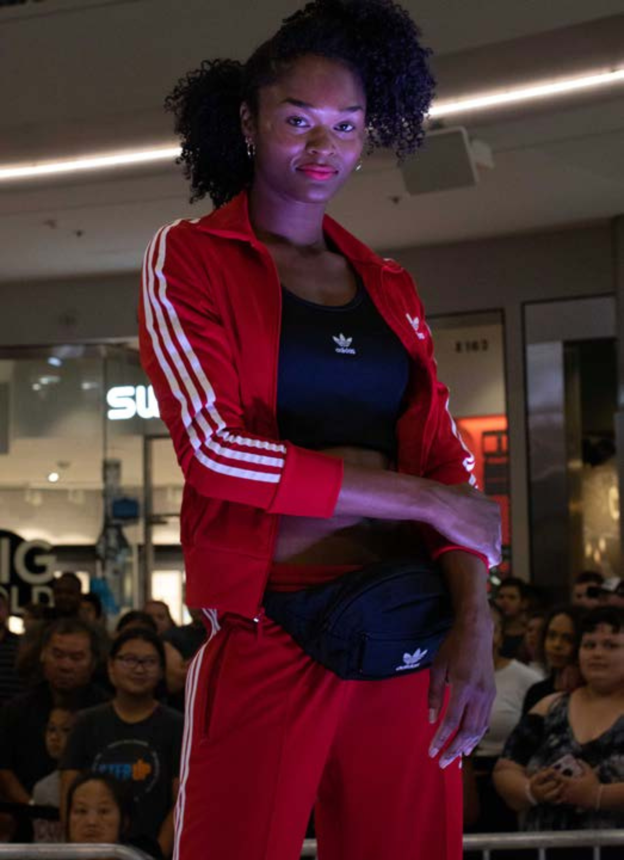 Two men stand together outdoors at a Destination Atlanta event, posing for a photo in front of a branded backdrop.