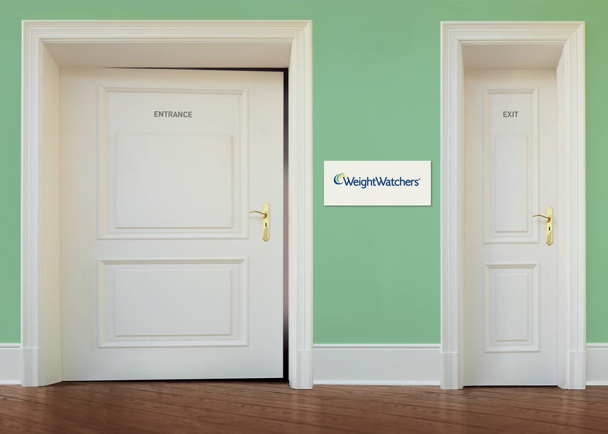 Large entrance door beside a small exit door outside a WeightWatchers office, illustrating how customer acquisition often outpaces long-term retention.